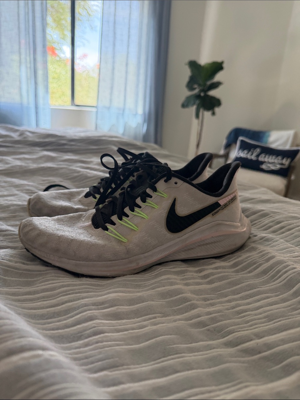 Nike women’s White/Black Running Shoes with Neon Accents